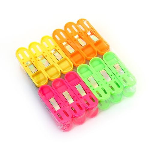 Multicolor non-slip plastic clips for secure cloth drying.