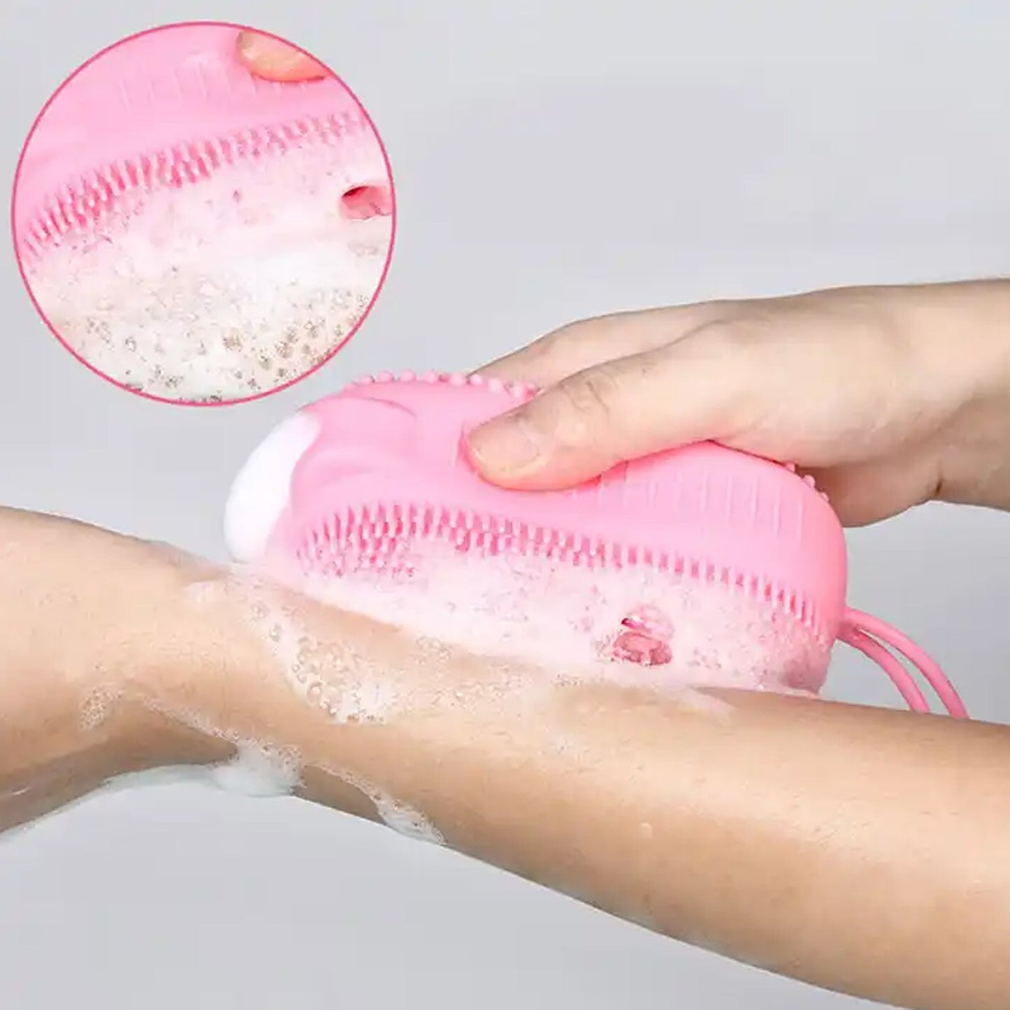 Double-sided silicone bath brush designed for deep cleaning and skin exfoliation.