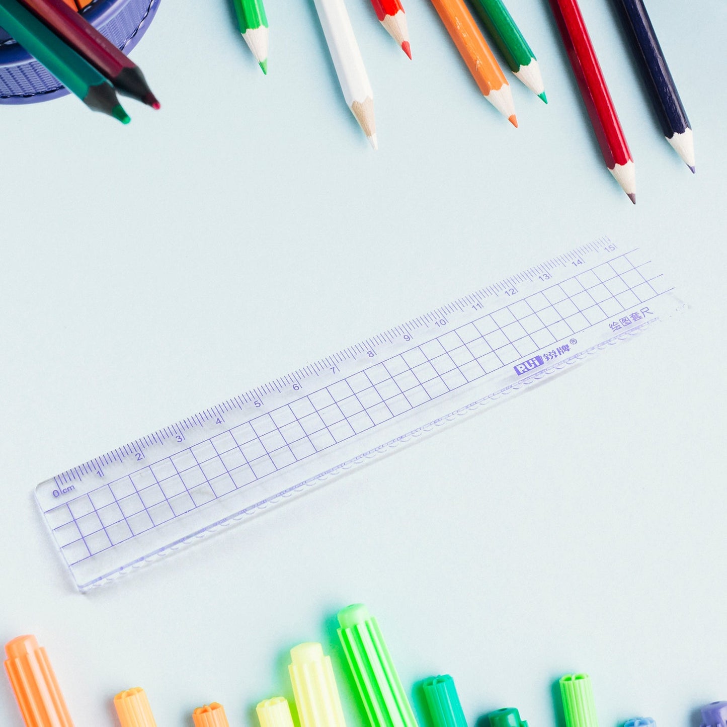 Assorted ruler set for educational and office tasks, featuring different ruler types.