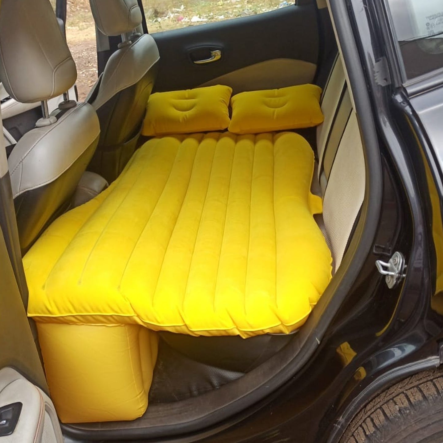 Portable inflatable bed with pillows for camping in car