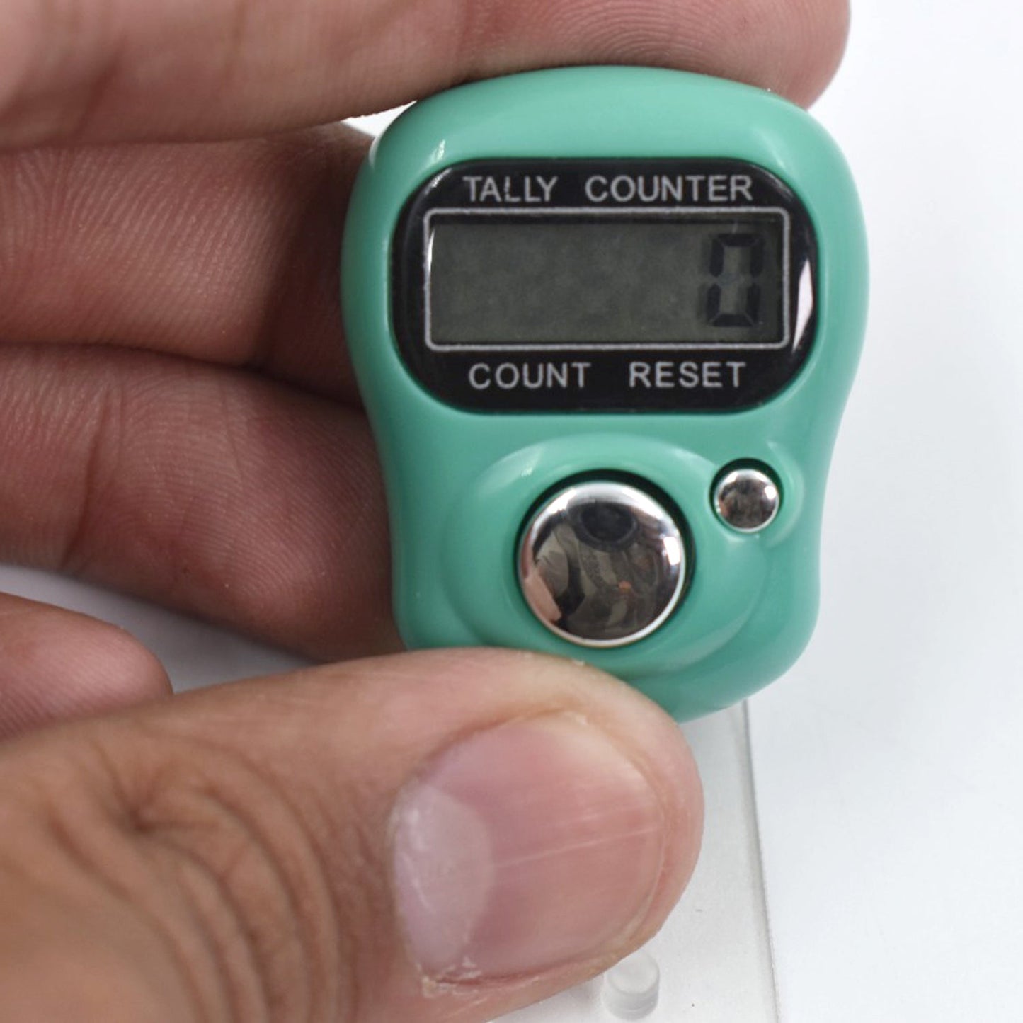 Ergonomic tally counter with a sleek design for comfortable use.