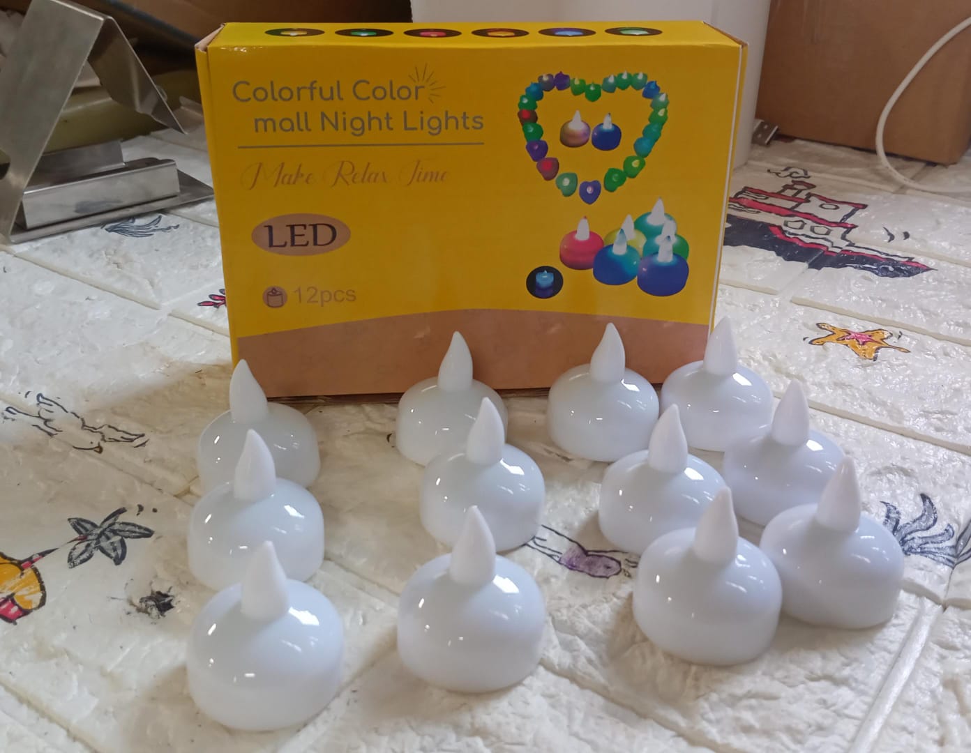 Set of battery-operated floating candles