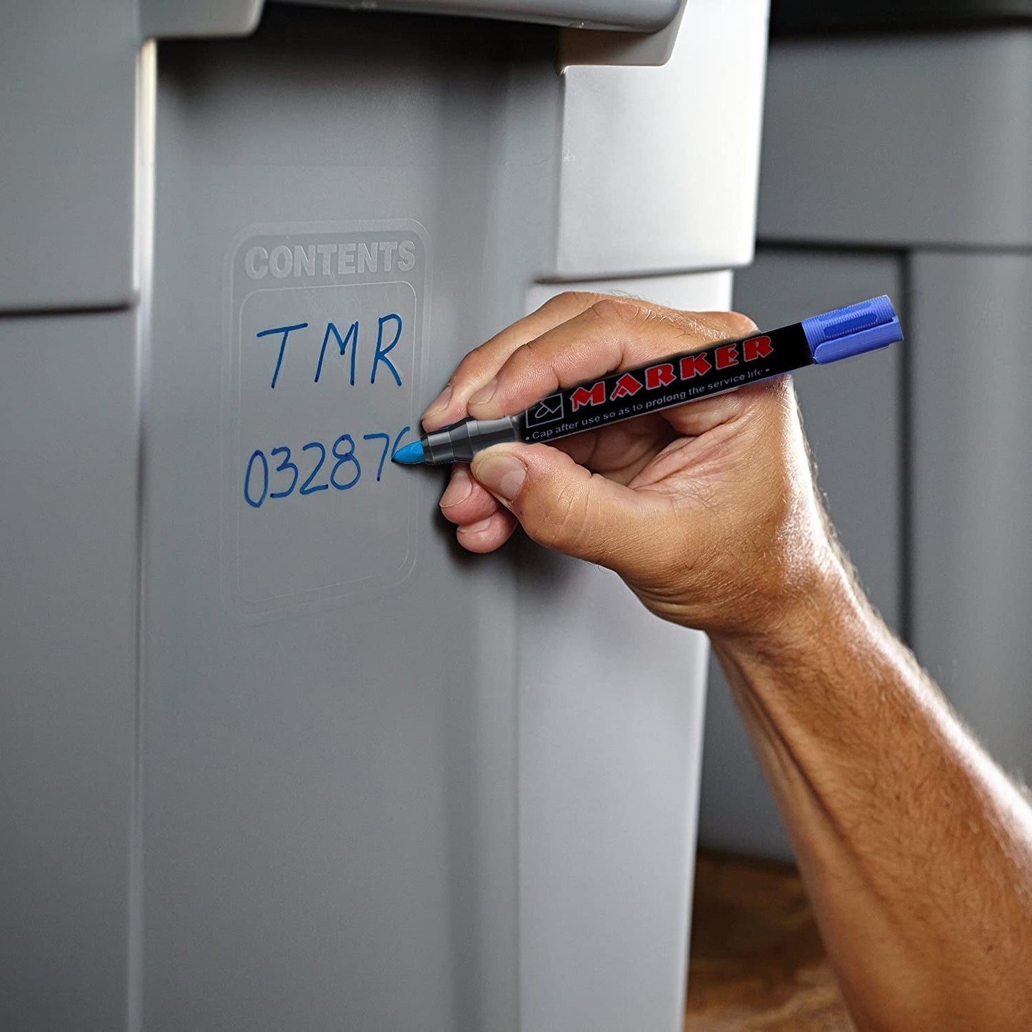 Blue permanent markers for whiteboard with cap on