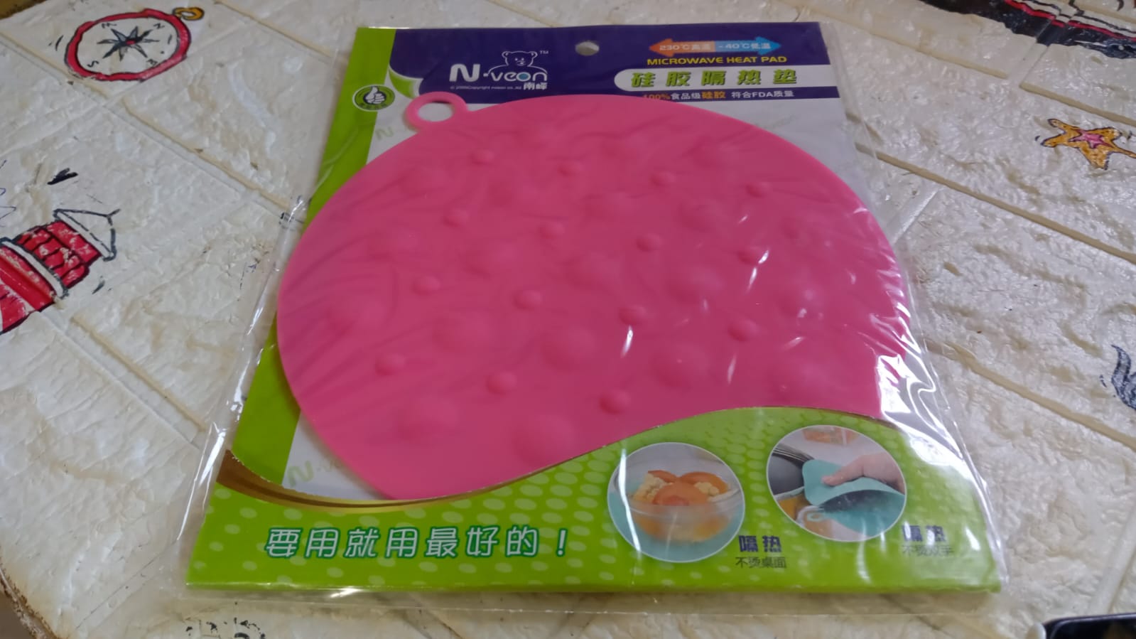 pink colored pot pad