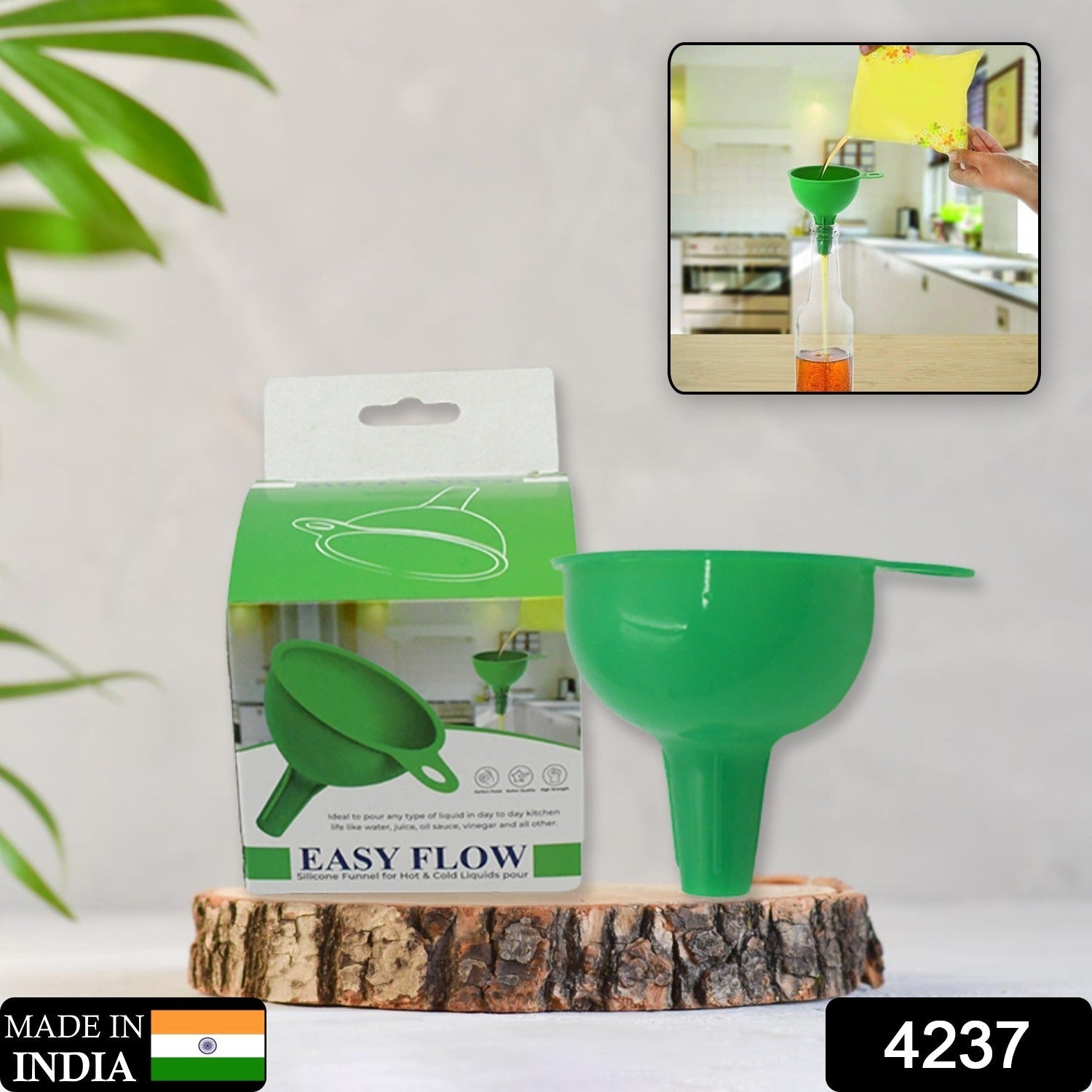 Funnel for pouring liquids, sauces, and small grains with green silicone material